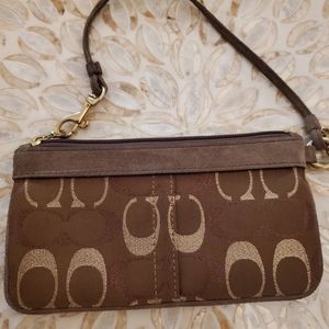 Coach brown metallic wristlet